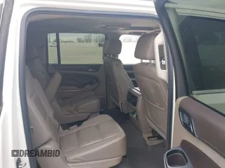 2015 Chevrolet Suburban LTZ with VIN 1GNSCKKC7FR641421, listed as a IAAI auction lot 41637137 with 139,001 mi miles and . Bid and sale history available at DreamBid. Image 8.