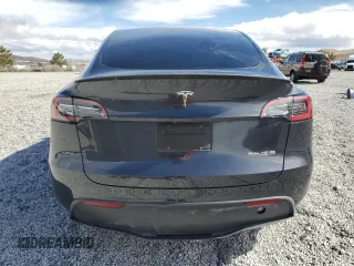 2024 Tesla Model Y Performance z VIN 7SAYGDEF6RF166365, wystawiony jako Copart lot #48885585 z przebiegiem Nie podano mil oraz Szkoda całkowita • Salvage title. Historia ofert i sprzedaży dostępna na DreamBid. Obrazek 6.