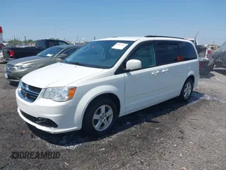 2012 Dodge Grand Caravan SXT with VIN 2C4RDGCG9CR200432, listed as a IAAI auction lot 42027477 with 99,076 mi miles and . Bid and sale history available at DreamBid. Image 18.