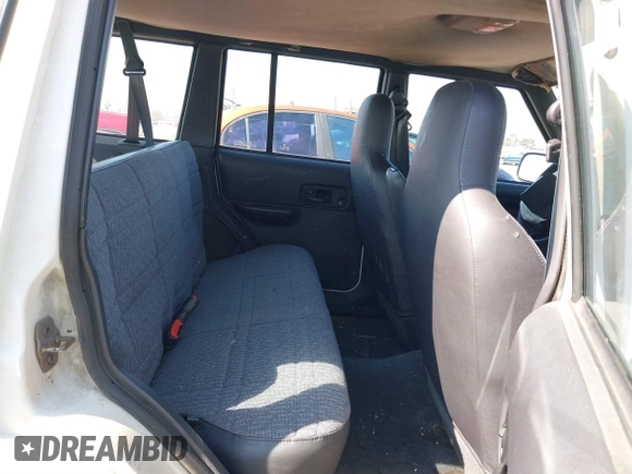2001 Jeep Cherokee Sport with VIN 1J4FT48S81L507558, listed as a IAAI auction lot 41586992 with 279,132 mi miles. Bid and sale history available at carsss.com. Image 8.