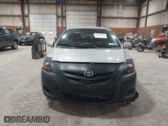 2008 Toyota Yaris with VIN JTDBT903781251568, listed as a IAAI auction lot 42090260 with 264,356 mi miles. Bid and sale history available at carsss.com. Image 6.