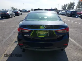 2016 Mazda 6 i Sport with VIN JM1GJ1U51G1445925, listed as a IAAI auction lot 41980386 with Not Provided miles and . Bid and sale history available at DreamBid. Image 15.