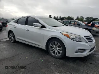 2013 Hyundai Azera с VIN KMHFG4JG8DA228669, выставлен на аукционе Copart как лот 62734185 с пробегом 148 611 миль миль и Чистый • Clean title. История ставок и продаж доступна на DreamBid. Изображение 4.