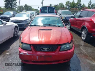 2002 Ford Mustang Standard z VIN 1FAFP40422F114992, wystawiony jako IAAI lot #40289505 z przebiegiem Nie podano mil oraz . Historia ofert i sprzedaży dostępna na DreamBid. Obrazek 12.