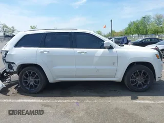 2021 Jeep Grand Cherokee Overland with VIN 1C4RJFCG6MC592296, listed as a IAAI auction lot 42170899 with 56,553 mi miles and . Bid and sale history available at DreamBid. Image 13.