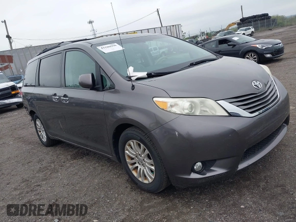 2014 Toyota Sienna XLE with VIN 5TDYK3DC0ES436502, listed as a IAAI auction lot 42180990 with 154,839 mi miles and . Bid and sale history available at DreamBid. Image 1.