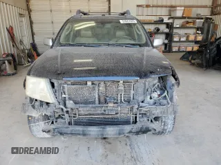 2009 Nissan Frontier LE with VIN 1N6AD09U79C409698, listed as a Copart auction lot 55843545 with 230,334 mi miles and Salvage title. Bid and sale history available at DreamBid. Image 5.
