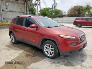 2016 Jeep Cherokee Latitude with VIN 1C4PJLCB8GW377953, listed as a Copart auction lot 57815025 with 143,848 mi miles and Salvage title. Bid and sale history available at DreamBid. Image 4.