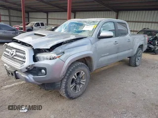 2017 Toyota Tacoma SR5 with VIN 3TMDZ5BN3HM025433, listed as a IAAI auction lot 41058797 with 68,355 mi miles and . Bid and sale history available at DreamBid. Image 2.