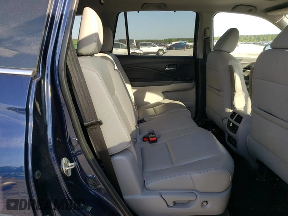 2019 Honda Pilot Touring 8-Passenger z VIN 5FNYF6H90KB000303, wystawiony jako Copart lot #52410585 z przebiegiem 129 190 mil mil oraz Szkoda całkowita • Salvage title. Historia ofert i sprzedaży dostępna na DreamBid. Obrazek 11.