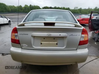 2002 Hyundai Accent GL z VIN KMHCG45C12U355561, wystawiony jako Copart lot #54546945 z przebiegiem 22 893 mil mil oraz Szkody całkowita. Historia ofert i sprzedaży dostępna na DreamBid. Obrazek 6.