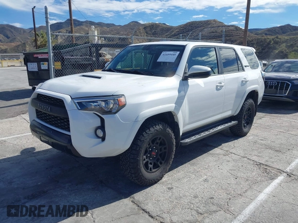 2018 Toyota 4Runner SR5 with VIN JTEBU5JRXJ5484802, listed as a IAAI auction lot 41609448 with 71,085 mi miles and . Bid and sale history available at DreamBid. Image 2.