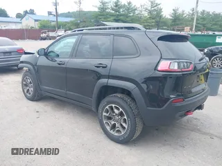 2021 Jeep Cherokee Trailhawk with VIN 1C4PJMBX0MD167941, listed as a IAAI auction lot 42507379 with 70,414 mi miles and . Bid and sale history available at DreamBid. Image 3.