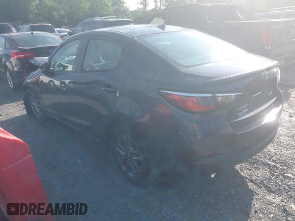 2019 Toyota Yaris L z VIN 3MYDLBYV8KY515505, wystawiony jako IAAI lot #42312231 z przebiegiem 94 601 mil mil oraz . Historia ofert i sprzedaży dostępna na DreamBid. Obrazek 3.