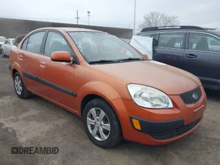 2009 Kia Rio LX with VIN KNADE223096543331, listed as a IAAI auction lot 41978544 with 166,749 mi miles and . Bid and sale history available at DreamBid. Image 1.