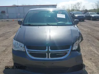 2015 Dodge Grand Caravan SE with VIN 2C4RDGBG2FR684367, listed as a IAAI auction lot 42167621 with 216,628 mi miles and . Bid and sale history available at DreamBid. Image 12.