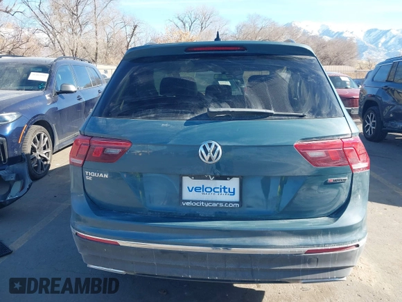 2021 Volkswagen Tiguan SE with VIN 3VV2B7AXXMM089913, listed as a IAAI auction lot 41402158 with 68,158 mi miles and . Bid and sale history available at DreamBid. Image 16.