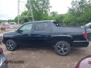 2013 Honda Ridgeline Sport with VIN 5FPYK1F73DB016232, listed as a IAAI auction lot 42330362 with 214,668 mi miles and . Bid and sale history available at DreamBid. Image 14.