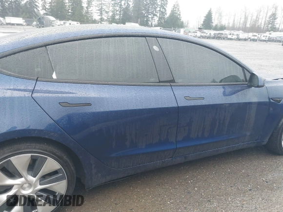 2022 Tesla Model 3 Long Range with VIN 5YJ3E1EB1NF142574, listed as a IAAI auction lot 41213900 with 127,404 mi miles and . Bid and sale history available at DreamBid. Image 13.