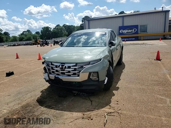 2023 Hyundai Santa Cruz SE z VIN 5NTJA4AE7PH069415, wystawiony jako Copart lot #56434945 z przebiegiem 43 866 mil mil oraz Szkoda całkowita • Salvage title. Historia ofert i sprzedaży dostępna na DreamBid. Obrazek 13.