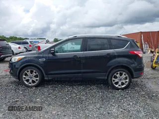 2015 Ford Escape Titanium с VIN 1FMCU0JXXFUB10676, выставлен на аукционе IAAI как лот 42412073 с пробегом 129 737 миль миль и . История ставок и продаж доступна на DreamBid. Изображение 14.