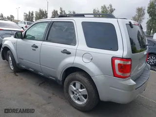2008 Ford Escape XLT with VIN 1FMCU03108KA62726, listed as a IAAI auction lot 41921634 with 201,169 mi miles. Bid and sale history available at carsss.com. Image 3.