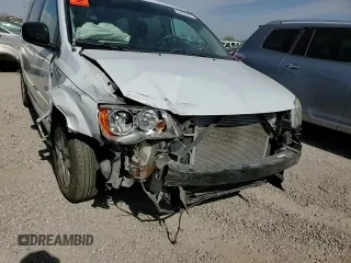 2017 Dodge Grand Caravan SE Plus z VIN 2C4RDGBG1HR864328, wystawiony jako Copart lot #56435325 z przebiegiem 128 795 mil mil oraz Szkoda całkowita • Salvage title. Historia ofert i sprzedaży dostępna na DreamBid. Obrazek 14.