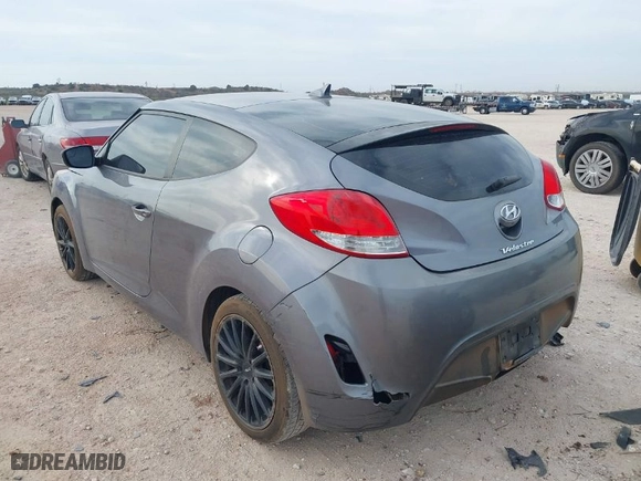 2016 Hyundai Veloster with VIN KMHTC6ADXGU277164, listed as a IAAI auction lot 41877724 with 136,690 mi miles. Bid and sale history available at carsss.com. Image 3.
