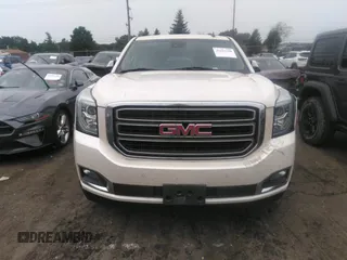 2015 GMC Yukon XL SLT with VIN 1GKS2HKC1FR120133, listed as a IAAI auction lot 39693190 with 211,652 mi miles. Bid and sale history available at carsss.com. Image 12.