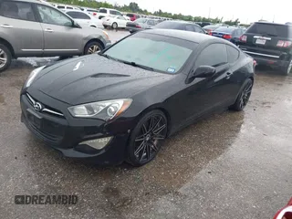 2014 Hyundai Genesis Coupe Premium with VIN KMHHT6KD5EU115007, listed as a IAAI auction lot 42686215 with 137,484 mi miles and . Bid and sale history available at DreamBid. Image 2.