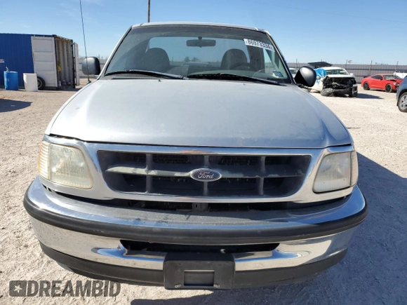 1998 Ford F-150 z VIN 1FTZF1762WKA87421, wystawiony jako Copart lot #86973334 z przebiegiem 217 978 mil mil oraz Szkoda całkowita • Salvage title. Historia ofert i sprzedaży dostępna na DreamBid. Obrazek 5.