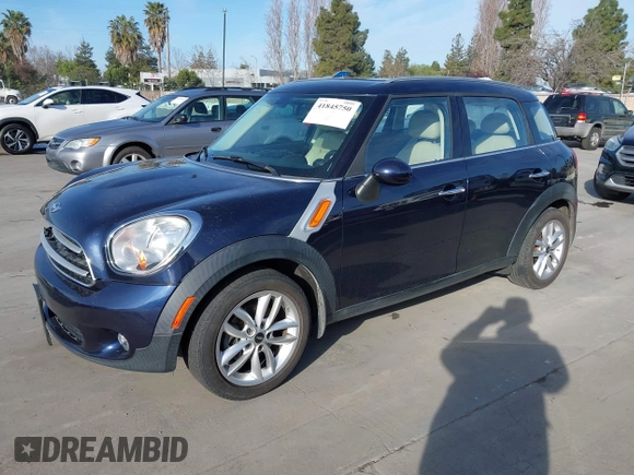 2014 MINI Countryman with VIN WMWZB3C50EWR42268, listed as a IAAI auction lot 41845750 with 117,192 mi miles and . Bid and sale history available at DreamBid. Image 2.