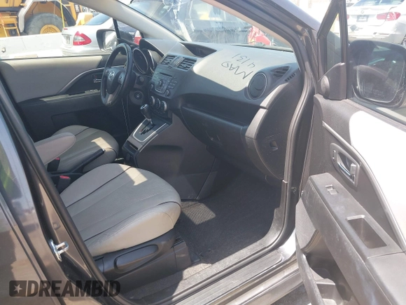 2014 Mazda 5 Grand Touring with VIN JM1CW2DL8E0171095, listed as a IAAI auction lot 41962650 with 85,048 mi miles and . Bid and sale history available at DreamBid. Image 5.