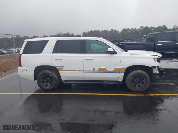 2019 Chevrolet Tahoe Commercial with VIN 1GNLCDEC4KR198330, listed as a IAAI auction lot 41542971 with 94,171 mi miles. Bid and sale history available at carsss.com. Image 14.