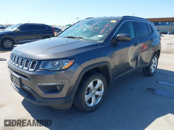 2018 Jeep Compass Altitude with VIN 3C4NJDBBXJT185252, listed as a IAAI auction lot 41847785 with 126,915 mi miles and . Bid and sale history available at carsss.com. Image 2.