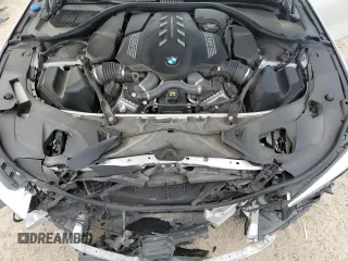 2023 BMW 8 Series M850i z VIN WBAGV8C01PCK29190, wystawiony jako Copart lot #47189205 z przebiegiem 32 691 mil mil oraz Szkoda całkowita • Salvage title. Historia ofert i sprzedaży dostępna na DreamBid. Obrazek 11.