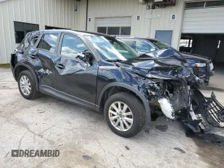 2016 Mazda CX-5 Touring with VIN JM3KE4CY8G0731778, listed as a Copart auction lot 50136095 with 115,979 mi miles and Salvage Title. Bid and sale history available at carsss.com. Image 4.