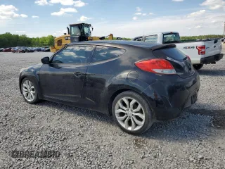 2012 Hyundai Veloster w/Black Int with VIN KMHTC6AD4CU061160, listed as a Copart auction lot 54139415 with 124,468 mi miles and Clean title. Bid and sale history available at DreamBid. Image 2.