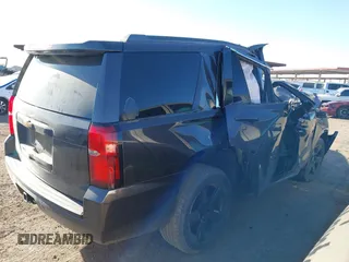 2015 Chevrolet Tahoe LT with VIN 1GNSCBKC0FR167957, listed as a IAAI auction lot 41526568 with Not provided miles and . Bid and sale history available at DreamBid. Image 4.