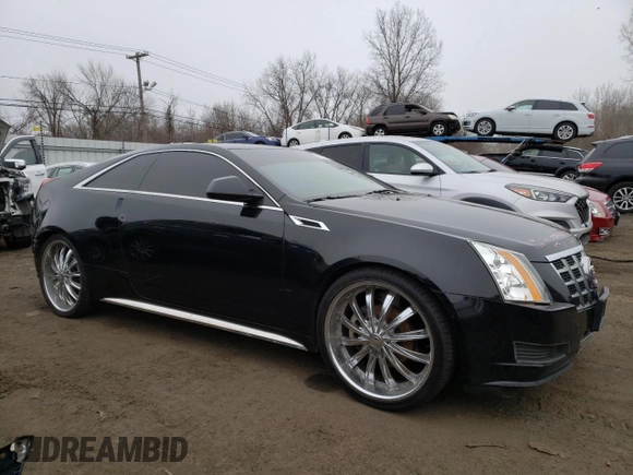 2013 Cadillac CTS z VIN 1G6DA1E31D0154605, wystawiony jako Copart lot #87380334 z przebiegiem 129 114 mil mil oraz Szkoda całkowita • Salvage title. Historia ofert i sprzedaży dostępna na DreamBid. Obrazek 4.