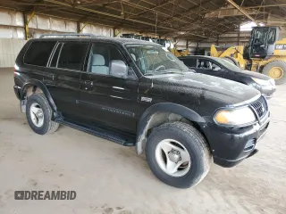 2001 Mitsubishi Montero ES z VIN JA4LS21H11P003533, wystawiony jako Copart lot #54403045 z przebiegiem 241 477 mil mil oraz Szkoda całkowita • Salvage title. Historia ofert i sprzedaży dostępna na DreamBid. Obrazek 4.