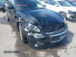 2013 Infiniti M with VIN JN1AY1AR6DM590187, listed as a IAAI auction lot 42096806 with 182,909 mi miles and . Bid and sale history available at DreamBid. Image 6.