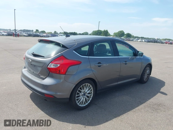 2014 Ford Focus Titanium with VIN 1FADP3N26EL453107, listed as a IAAI auction lot 42745891 with 148,743 mi miles and . Bid and sale history available at DreamBid. Image 4.
