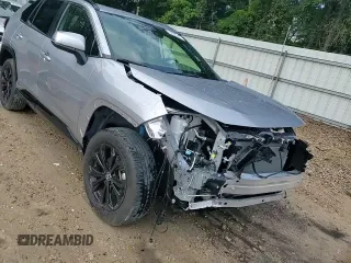 2023 Toyota RAV4 Hybrid SE с VIN JTM16RFV0PD084138, выставлен на аукционе Copart как лот 64999095 с пробегом 26 243 миль миль и Списание • Salvage title. История ставок и продаж доступна на DreamBid. Изображение 15.