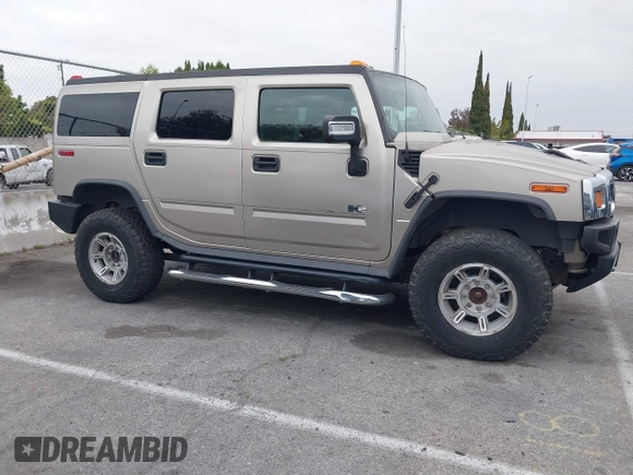 2005 Hummer H2 SUV with VIN 5GRGN23U95H129470, listed as a IAAI auction lot 42046654 with 63,489 mi miles. Bid and sale history available at carsss.com. Image 13.