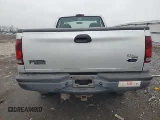 2002 Ford F-350 XL with VIN 1FTSF31F12EB21069, listed as a Copart auction lot 84287374 with 110,890 mi miles and Salvage Title. Bid and sale history available at DreamBid. Image 6.