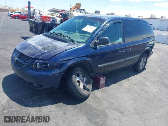 2005 Dodge Caravan SXT with VIN 1D8GP45R65B280660, listed as a IAAI auction lot 42169027 with 246,407 mi miles and . Bid and sale history available at carsss.com. Image 2.