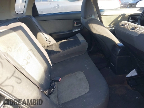 2008 Kia Spectra with VIN KNAFE162X85014915, listed as a IAAI auction lot 41679990 with Not provided miles and . Bid and sale history available at DreamBid. Image 8.