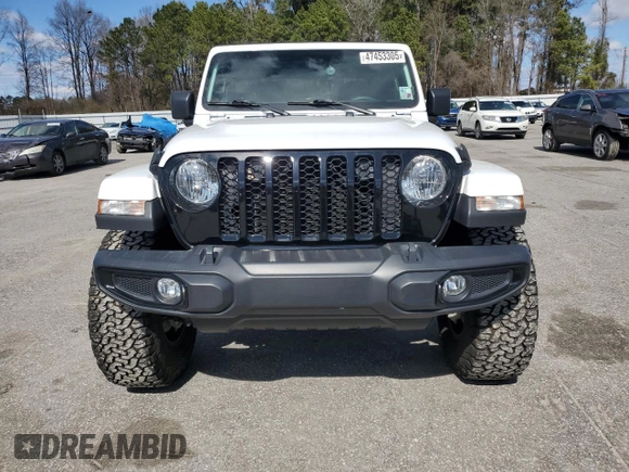 2023 Jeep Gladiator Sport S with VIN 1C6HJTAG4PL556387, listed as a Copart auction lot 47453305 with 35,611 mi miles and Salvage title. Bid and sale history available at DreamBid. Image 5.