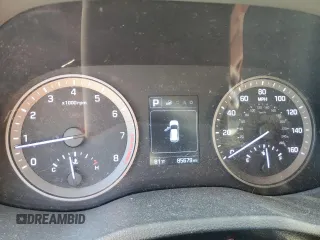 2017 Hyundai Tucson SE z VIN KM8J23A44HU511583, wystawiony jako Copart lot #57152345 z przebiegiem 85 679 mil mil oraz Szkoda całkowita • Salvage title. Historia ofert i sprzedaży dostępna na DreamBid. Obrazek 9.